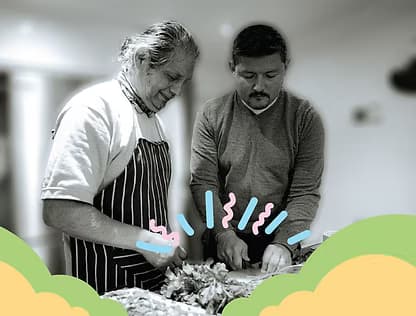 Two people cooking together