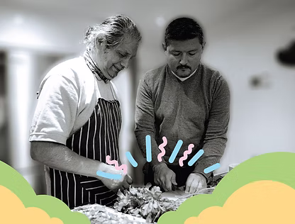 Two people cooking together
