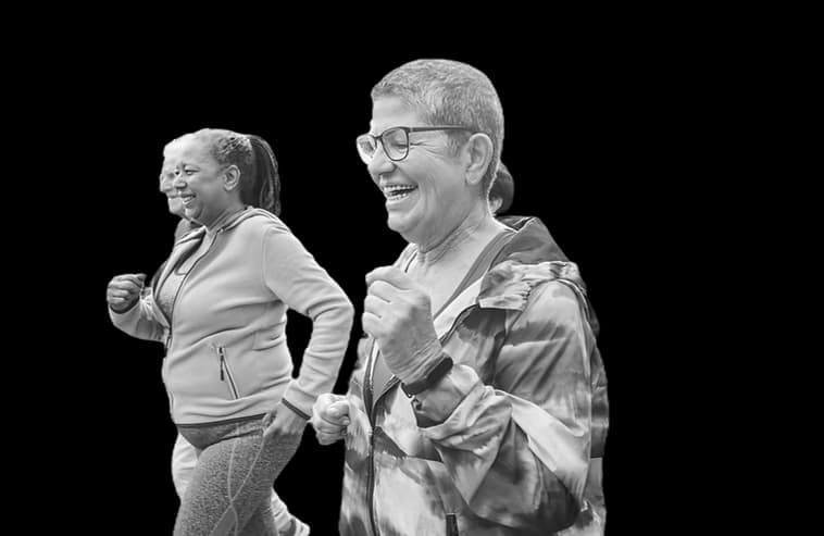 Two women jogging together