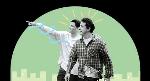 Two people walking forward